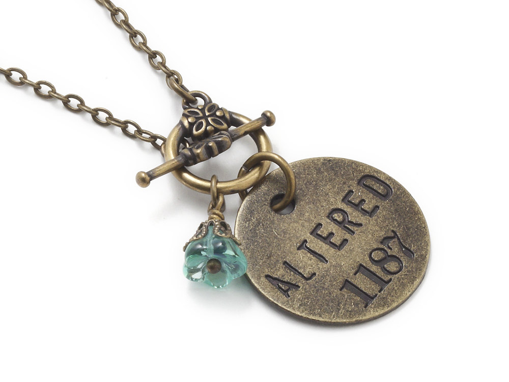 Antiqued brass gold Altered charm coin necklace filigree blue opal glass flower affirmation