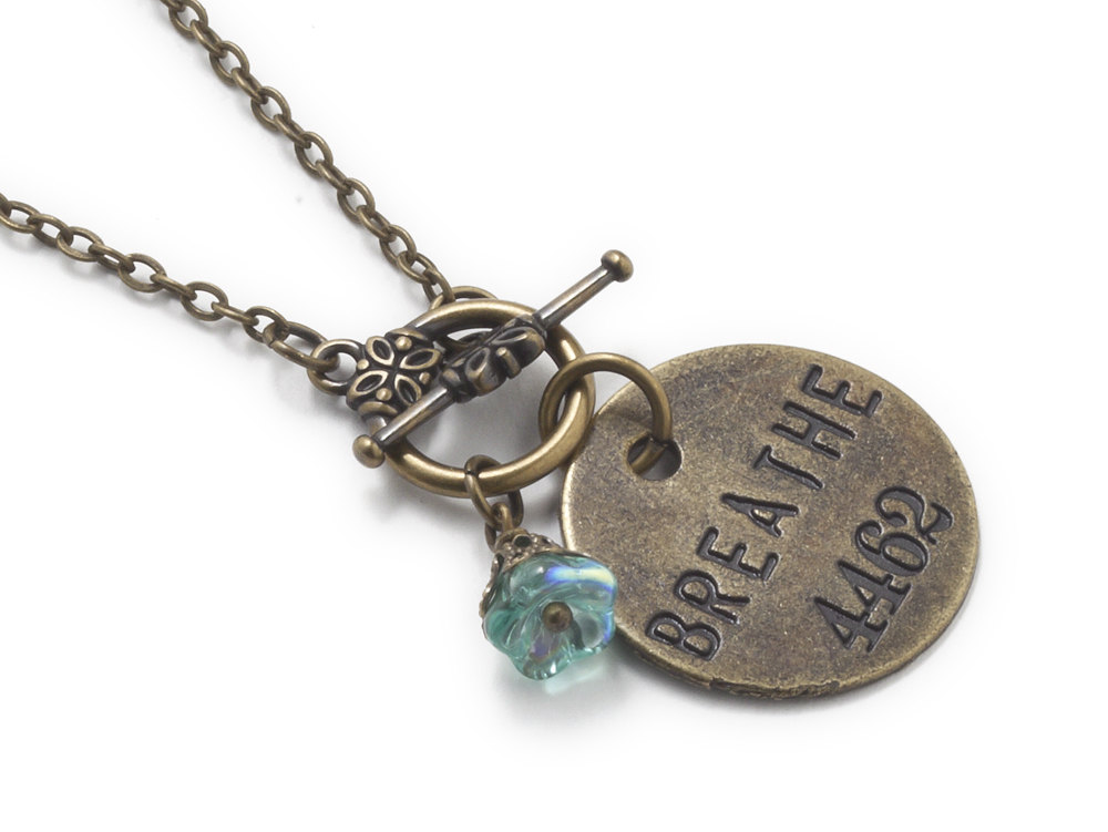 Antiqued brass gold Breathe charm coin necklace filigree blue opal glass flower affirmation