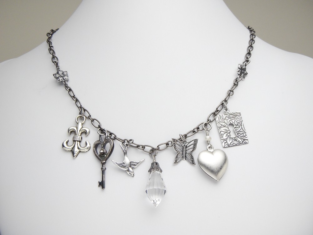 Antiqued silver charm necklace pearl crystal heart flower lock skeleton key fleur de lis filigree butterfly bird