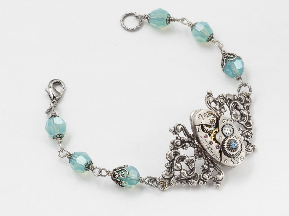 Steampunk Bracelet Vintage watch movement gears wire wrapped blue opal crystal beaded silver filigree flower bracelet Steampunk Nation