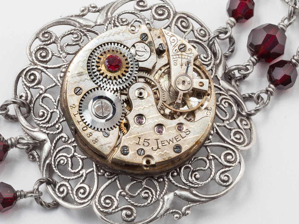 Steampunk Bracelet watch movement gears silver filigree garnet red crystal Steampunk jewelry