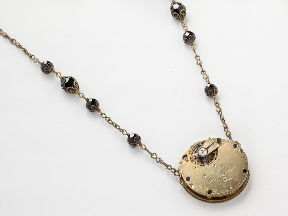 Steampunk jewelry Steampunk Necklace Antique gold English pocket watch movement Black crystal Filigree Victorian Pendant Statement