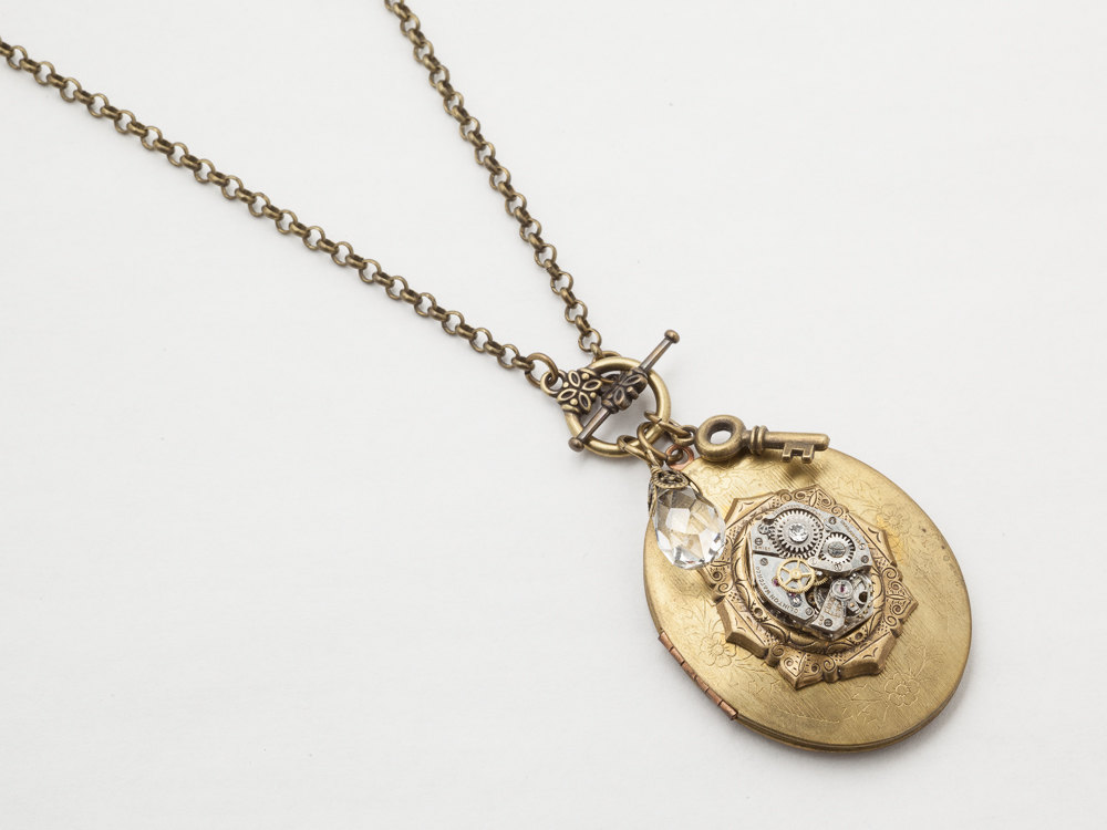 Steampunk Locket Necklace silver watch movement gears gold Oval Locket flower leaf skeleton key charm crystal Steampunk Jewelry