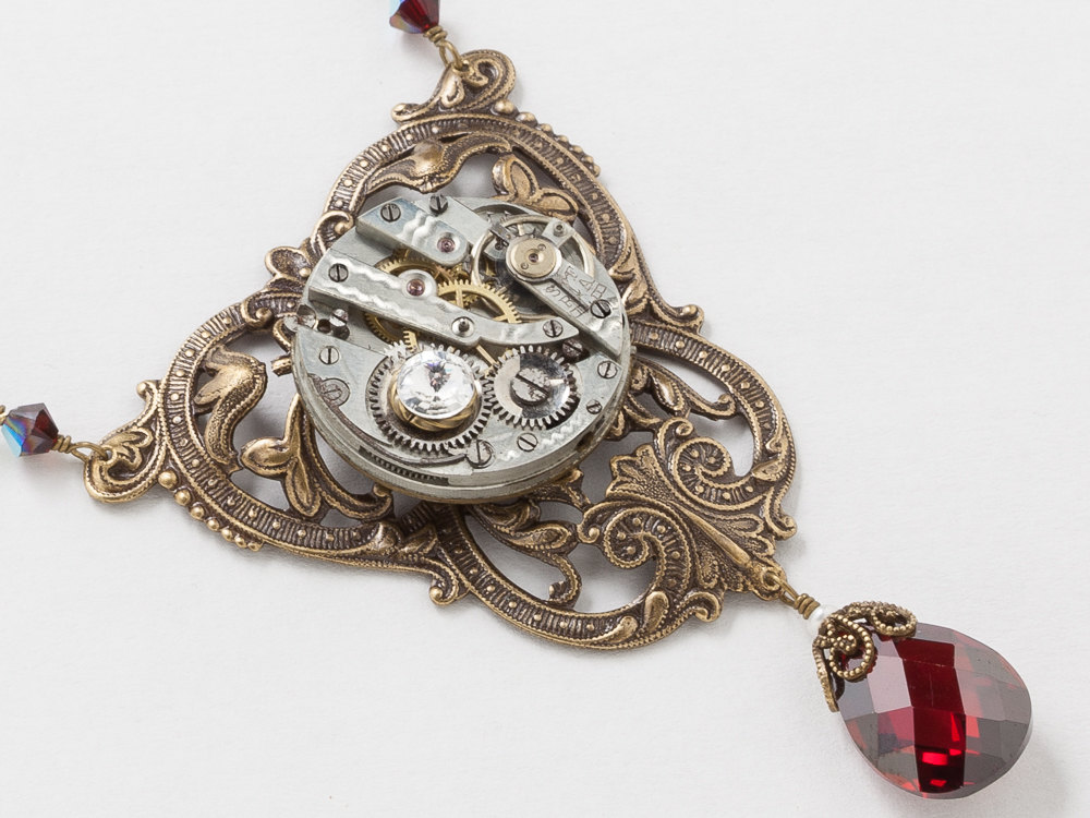 Steampunk Necklace Antique Silver Watch Movement on Victorian Leaf Flower Filigree with Pearl Garnet Crystal and Gold Bird Charms