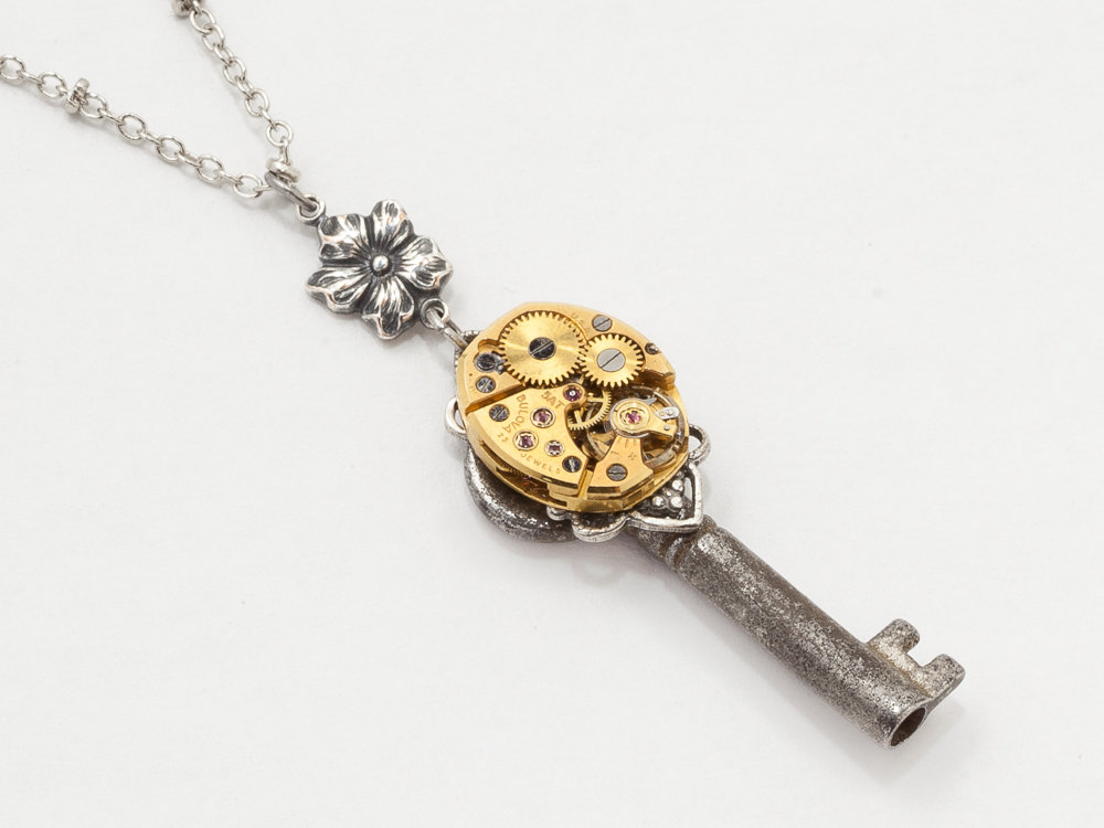 Steampunk Necklace Antique Victorian skeleton key gold watch movement silver flower filigree pendant necklace Steampunk jewelry