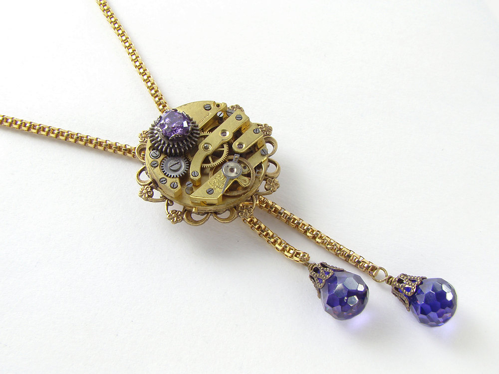 Steampunk Necklace Antiqued gold flower watch movement gears purple crystal briolette slide chain lariat
