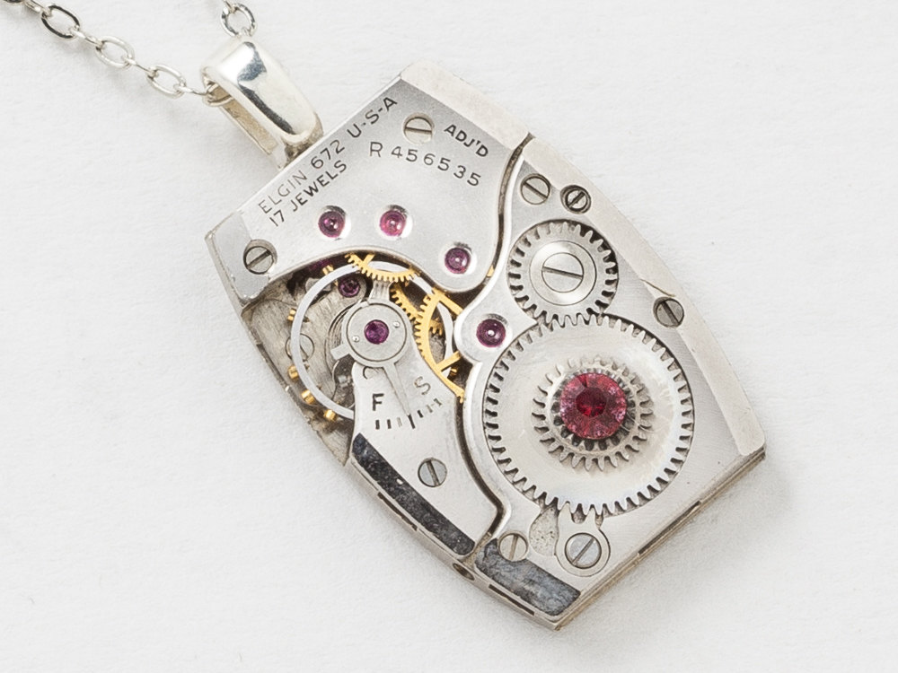 Steampunk Necklace Elgin watch movement pendant with ruby jewels gears and red garnet crystal
