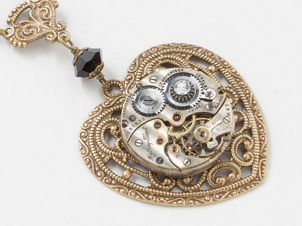 Steampunk Necklace Gold Heart Pendant with Antique Silver Watch Movement on Victorian Flower Filigree with Black Swarovski Crystal