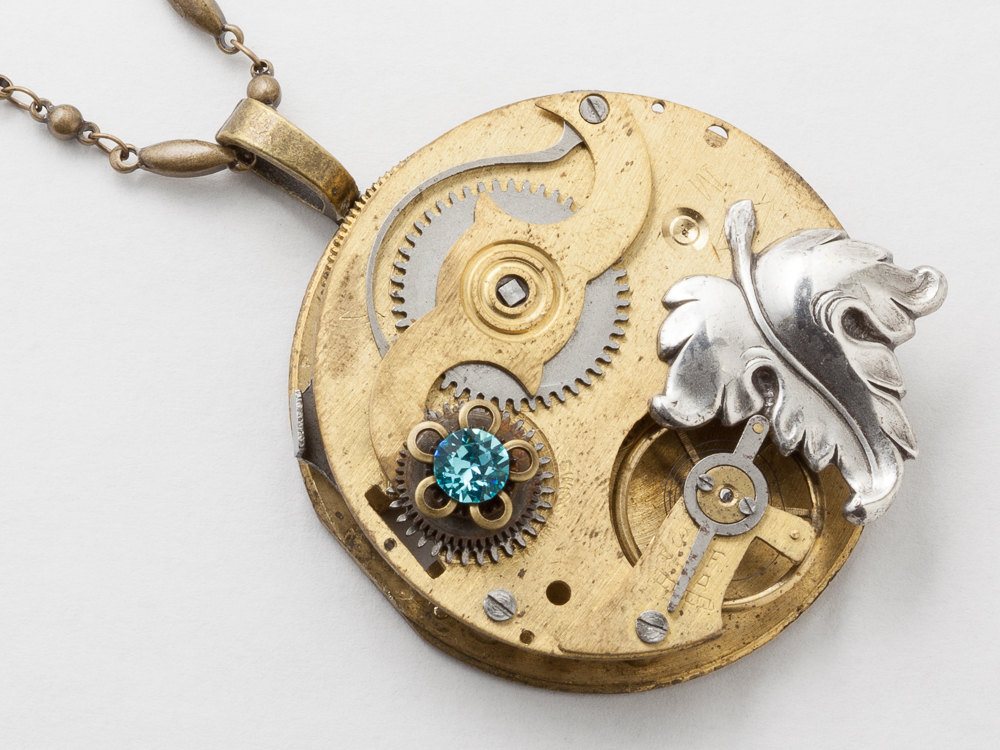 Steampunk Necklace gold pocket watch movement with blue crystal flower pendant silver leaf statement necklace Steampunk jewelry