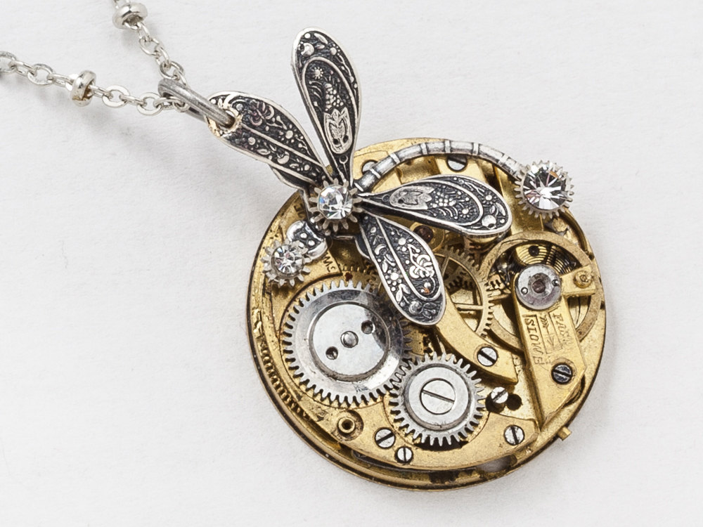 Steampunk Necklace gold pocket watch movement with silver dragonfly pendant and Swarovski crystal stones set in steel gears