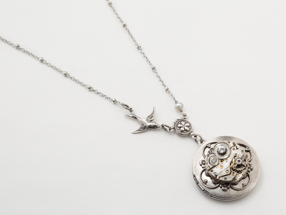 Steampunk Necklace Locket watch movement gears pearl filigree flower silver bird charm Swarovski crystal Steampunk jewelry