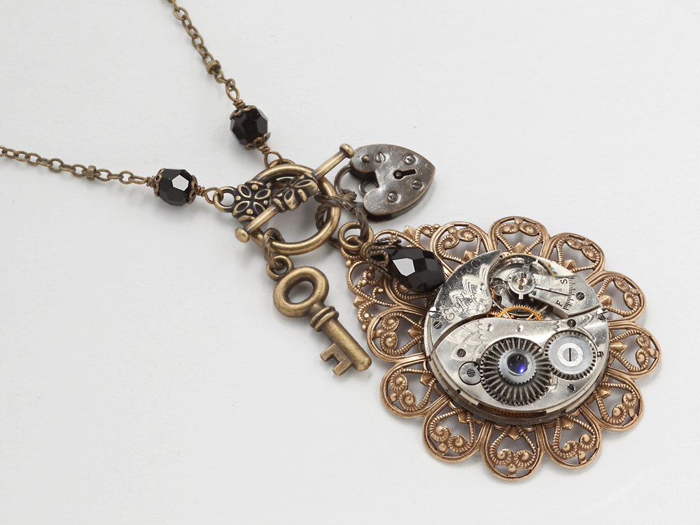 Steampunk necklace silver watch movement gears gold filigree flower heart lock skeleton key black crystal