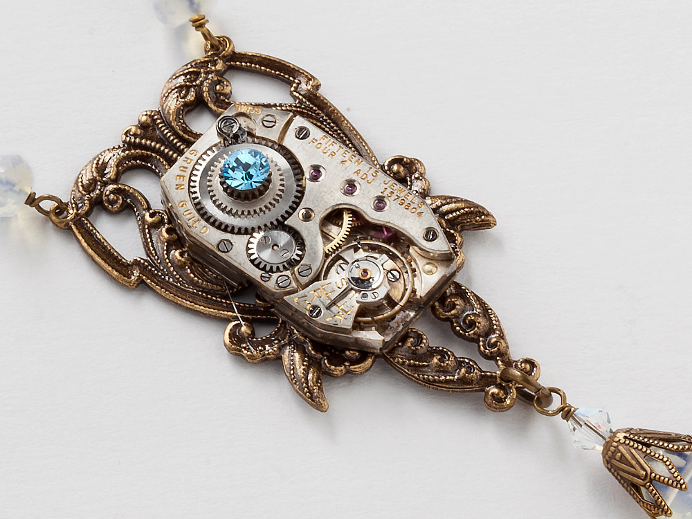Steampunk necklace silver watch movement gears opalite blue aquamarine crystal gold Victorian leaf