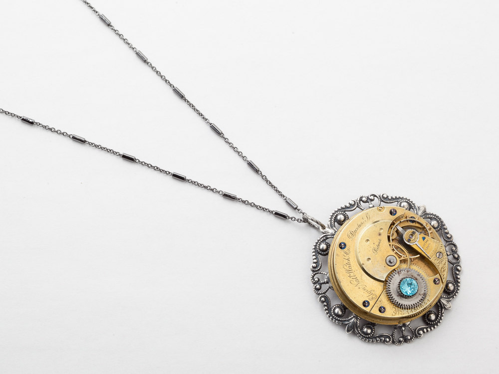 Steampunk Necklace Vintage Elgin gold pocket watch movement silver filigree bezel and blue crystal pendant necklace
