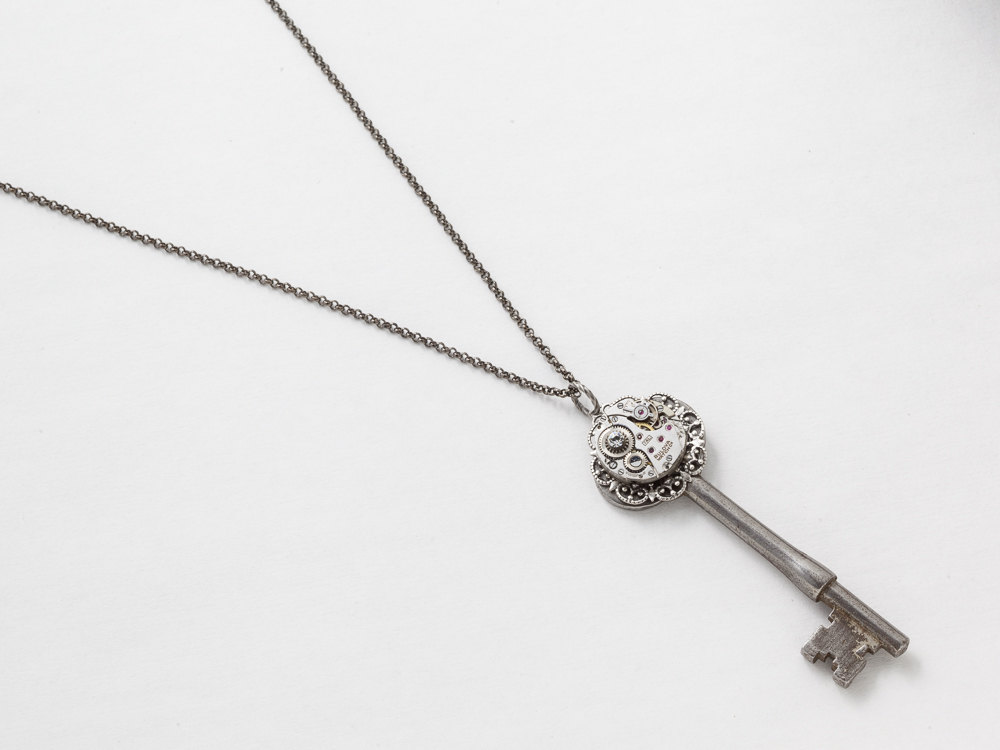 Steampunk Necklace watch movement on Victorian skeleton key pendant silver filigree Swarovski crystal