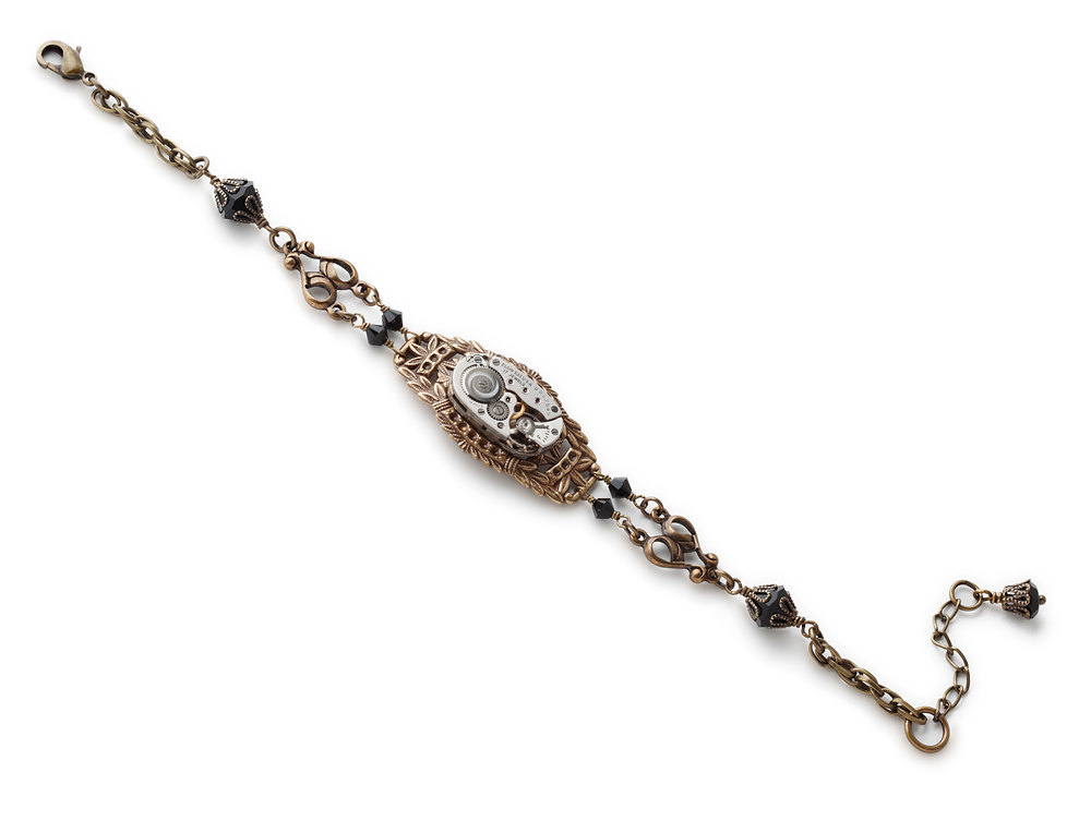 Steampunk Victorian gold brass filigree bracelet antique Elgin watch movement gears black Swarovski crystal