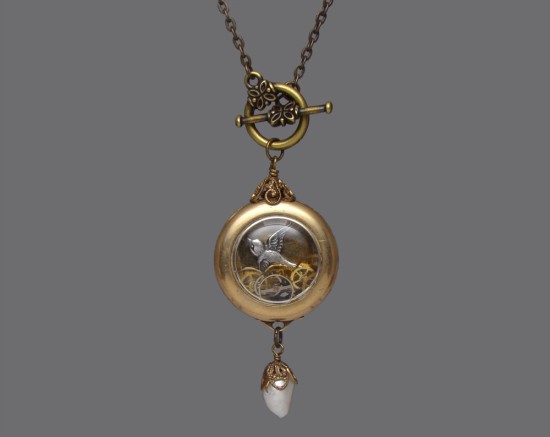 Steampunk Necklace 14k gold filled antique watch case with gears and heart shaped garnet
