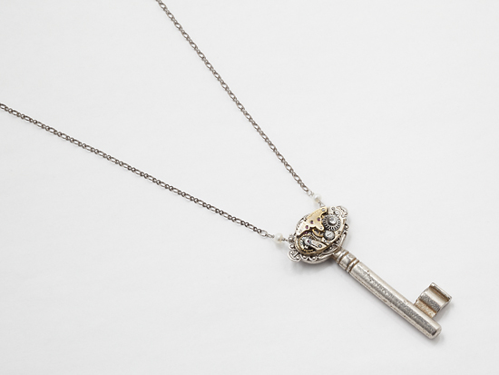 skeleton key watch movement gear silver filigree pearl crystal pendant by Maria Sparks